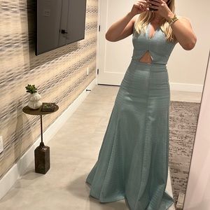 Worn once- ALEXIS powder blue gown.